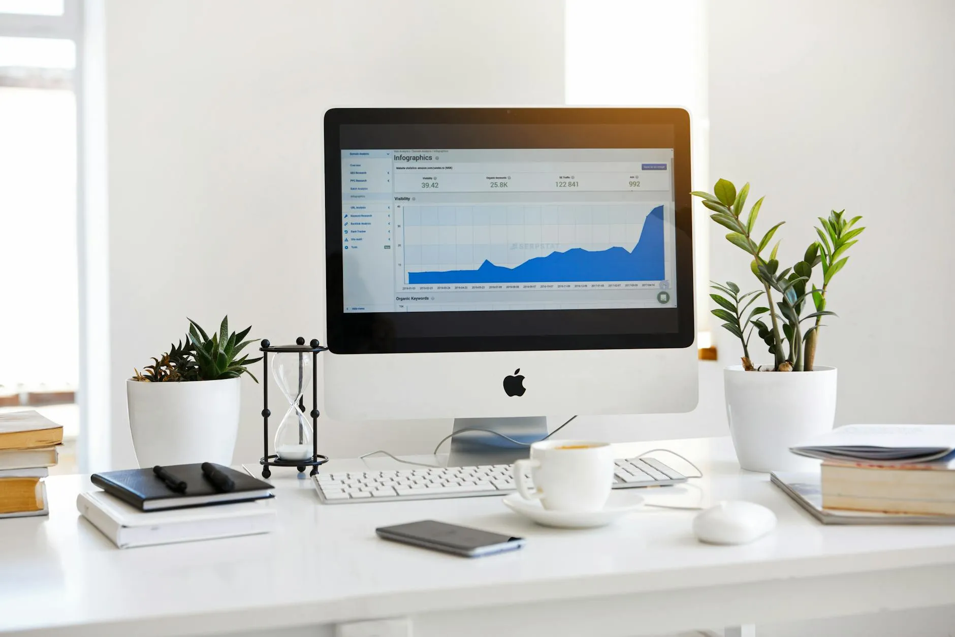 https://www.pexels.com/photo/silver-imac-displaying-line-graph-placed-on-desk-572056/