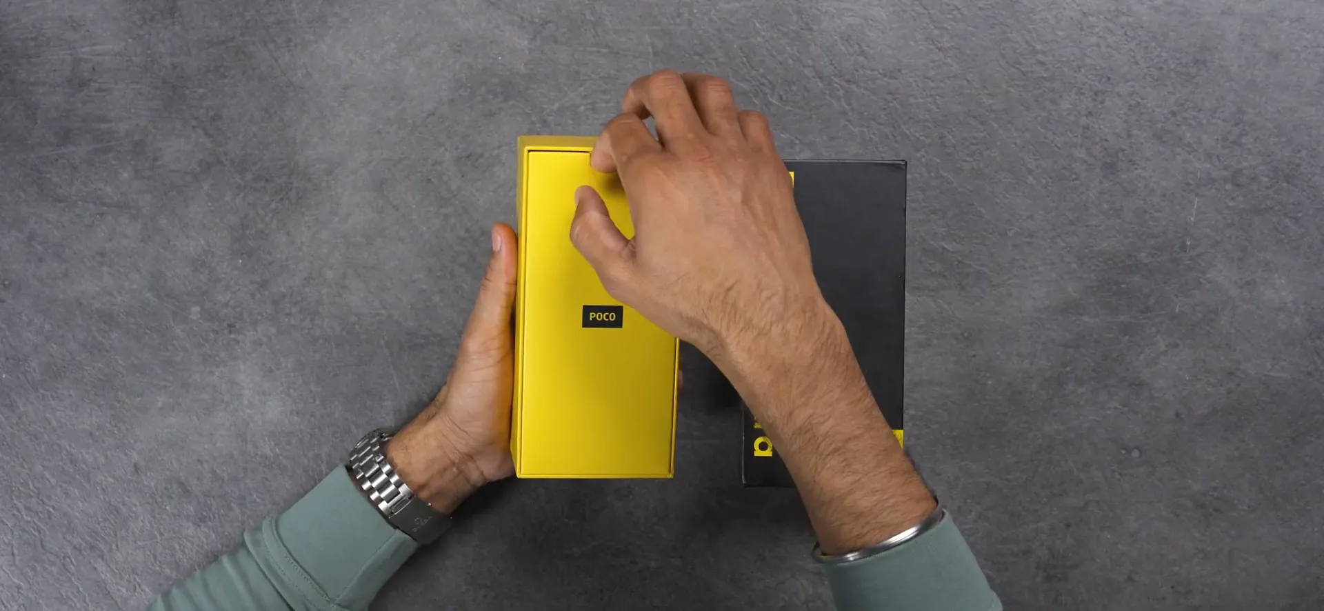 POCO F7 Ultra unboxing with yellow box and accessories